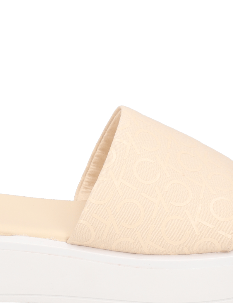 CALVIN-KLEIN-JEANS-FLATFORM-SLIDE---CANV-MONO