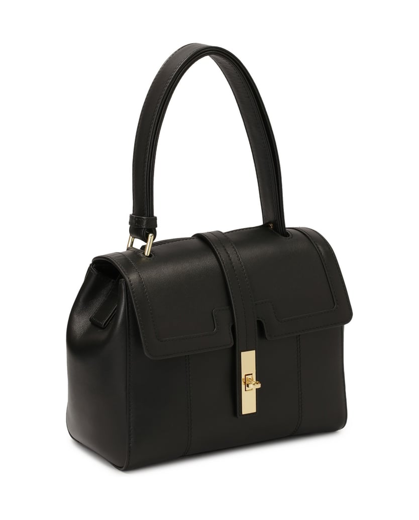Kazar-Black-leather-handbag-with-unique-flap-černá