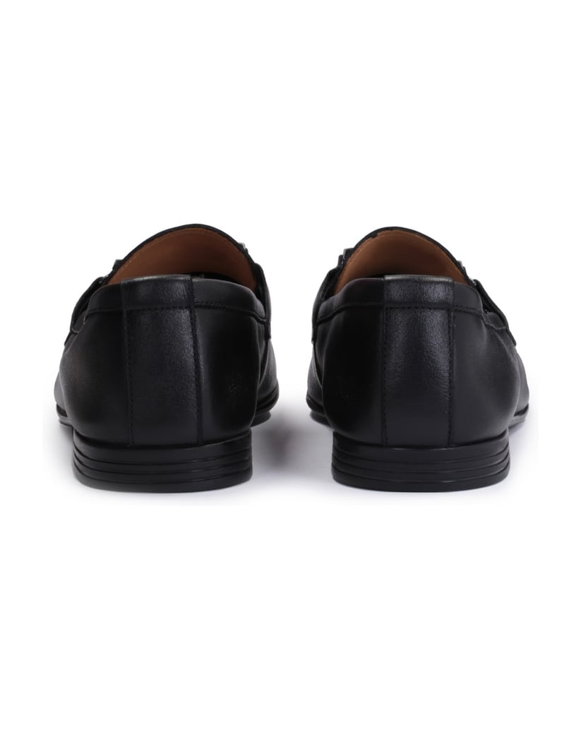 Kazar-Men’s-black-leather-loafers-with-a-metal-decoration-čierna