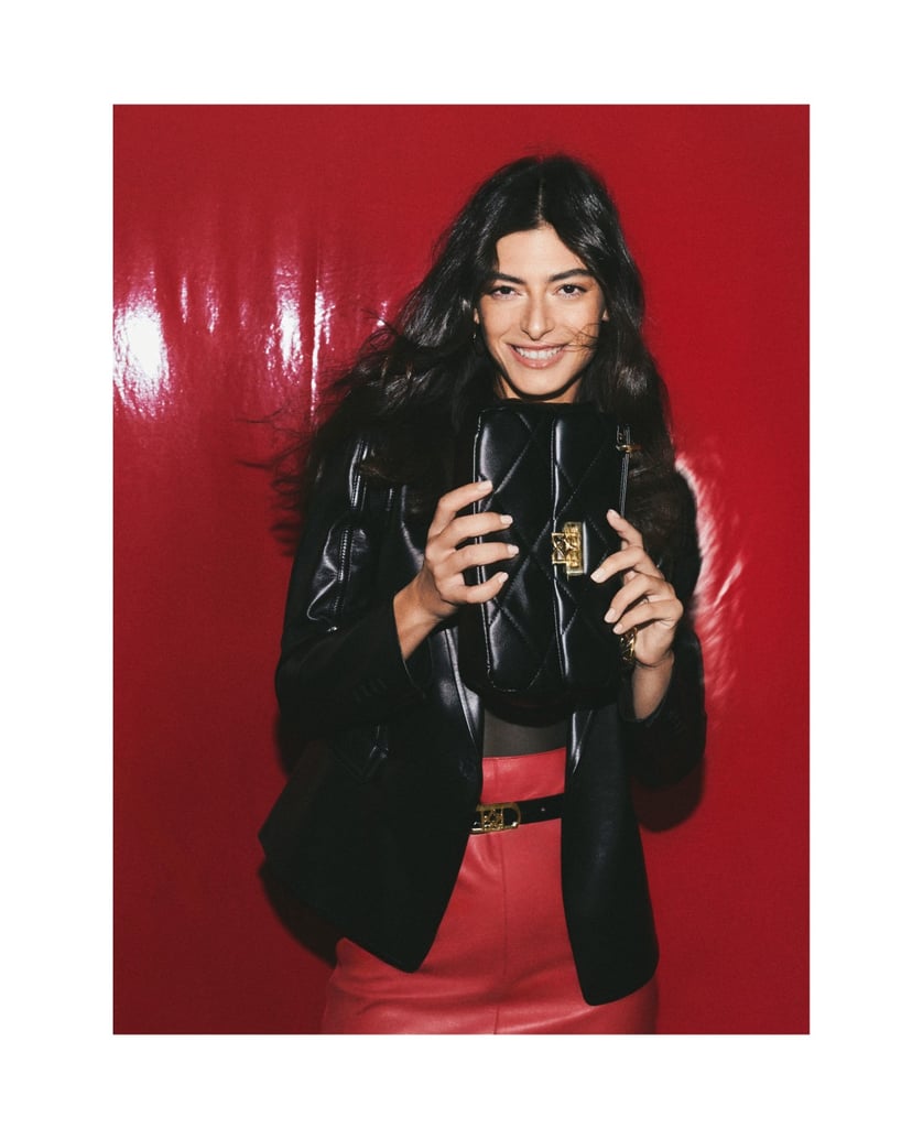 Kazar-Schwarze-gesteppte-Handtasche-mit-Henkel