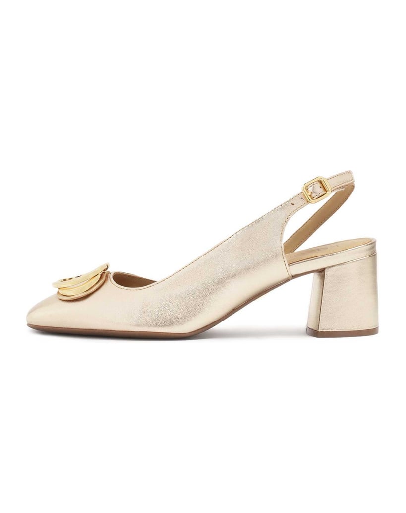 Kazar-Gold-pumps-with-open-heel-and-metal-embellishment-on-the-nose-zlatá