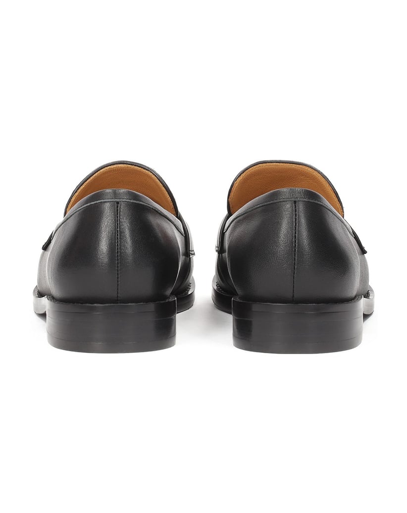 Kazar-Slipper-aus-Leder-mit-Naturhaar-im-Zebra