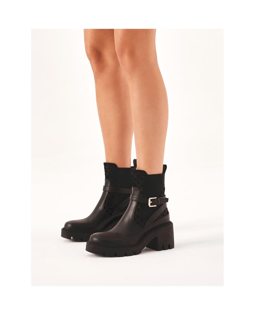 Kazar-Slip-on-black-boots-on-solid-sole-with-heel-černá