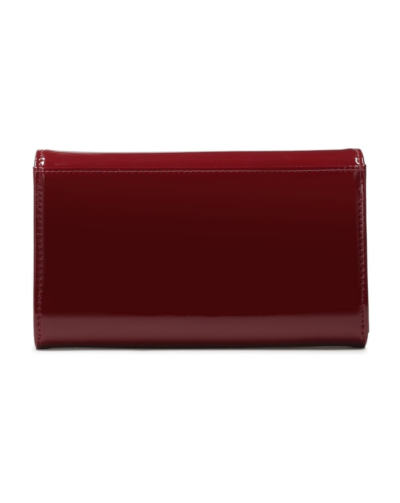 Kazar-Elegant-patent-wallet-with-large-decoration-on-the-front-červená