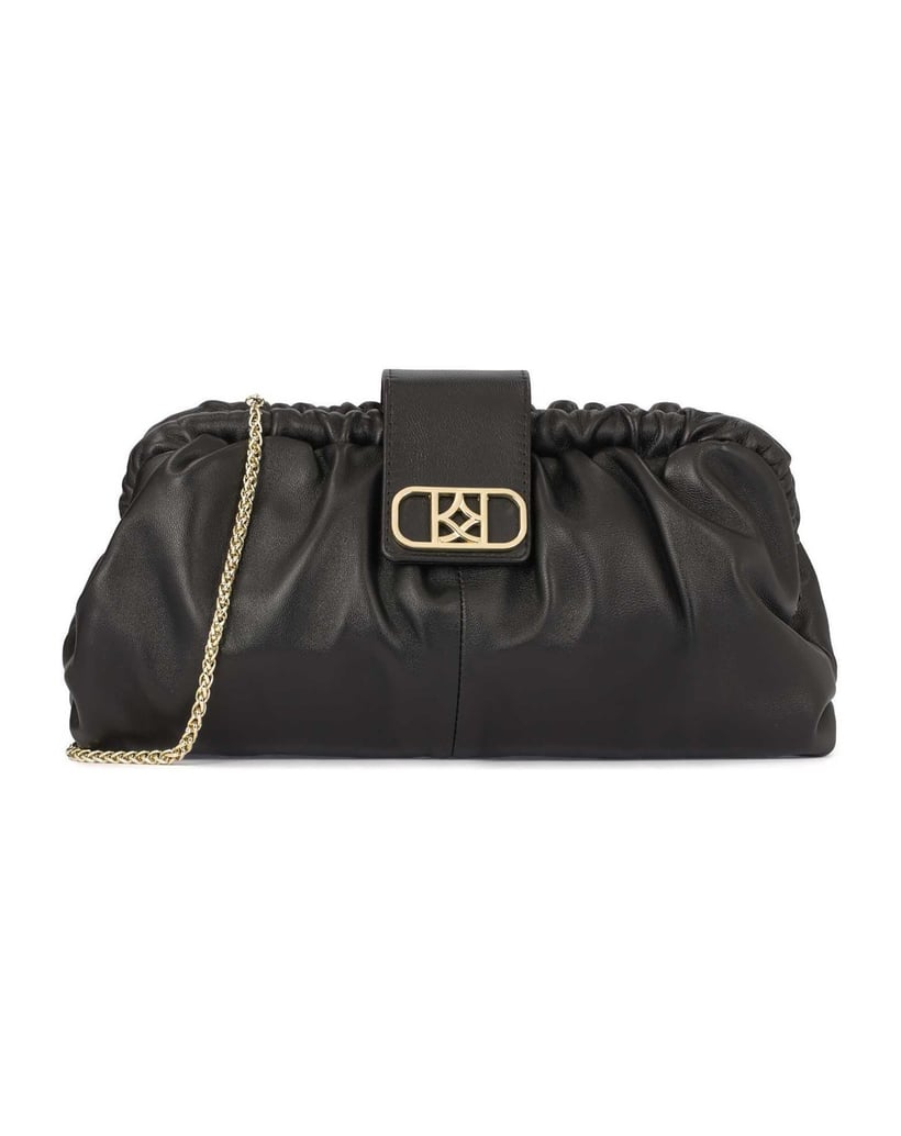 Kazar-Black-clutch-handbag-with-striking-logo-čierna