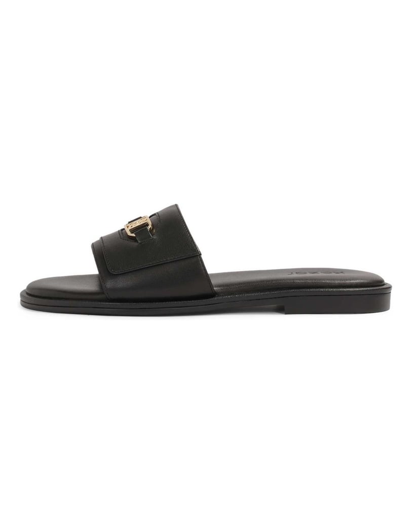 Kazar-Black-monogrammed-slides-on-a-flat-sole-černá