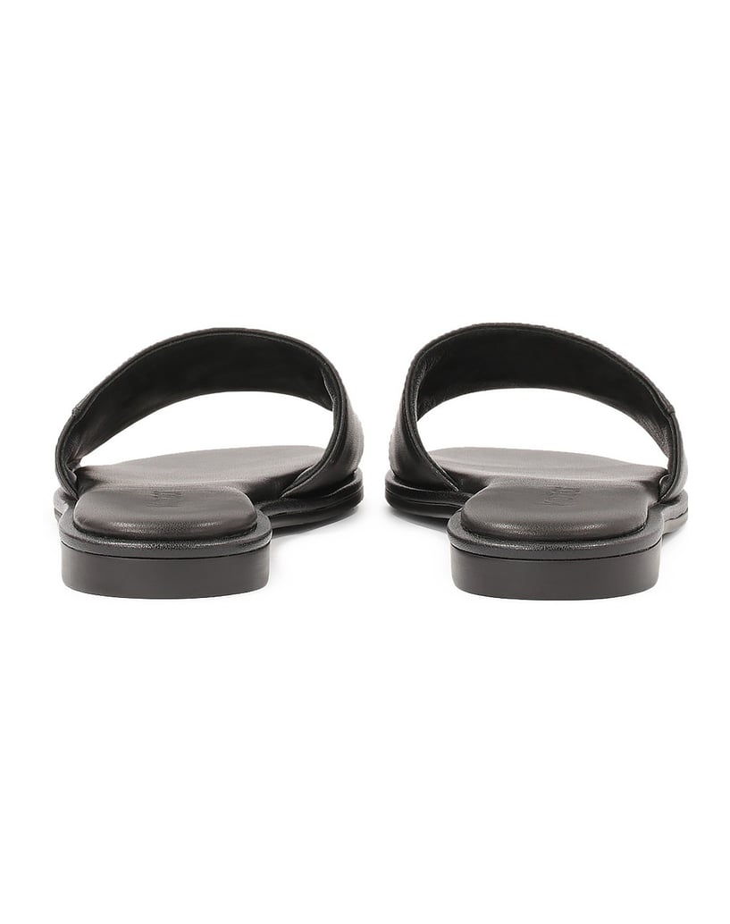 Kazar-Black-monogrammed-slides-on-a-flat-sole-černá
