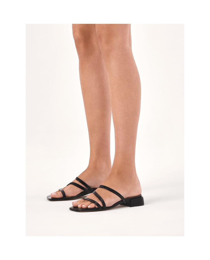 Kazar-Mules-on-a-flat-sole-made-of-patent-leather-čierna