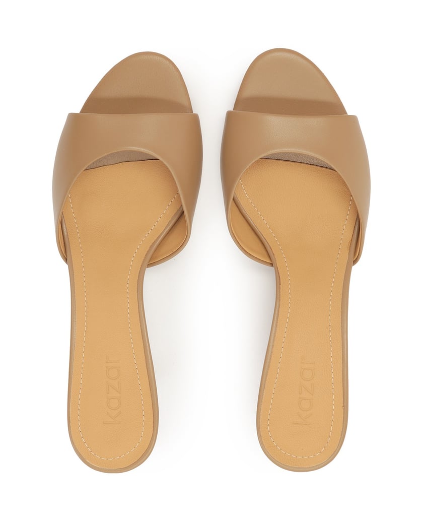 Kazar-Mules-on-a-low-stiletto-heel-in-a-light-brown-color-ťavia