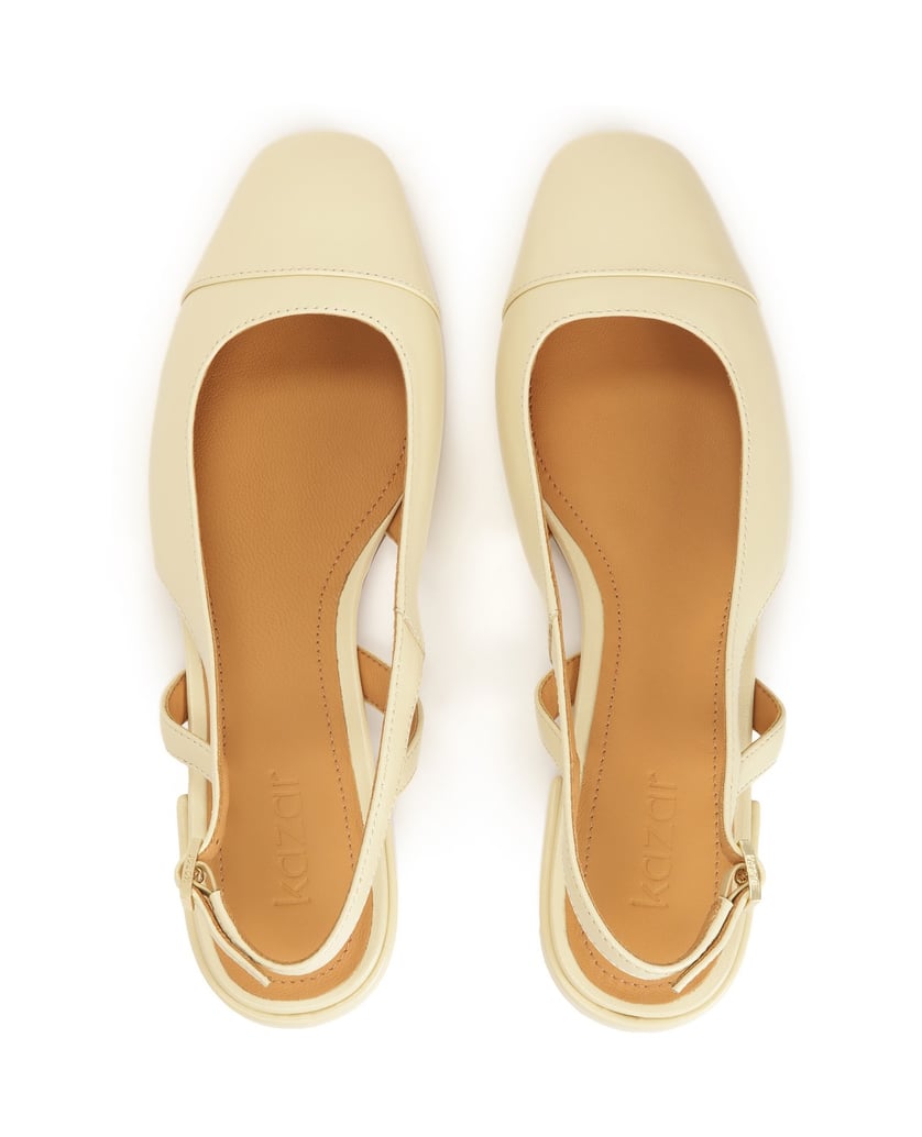 Kazar-Cremefarbene-Pumps-mit-fein-geschnittene-weiss