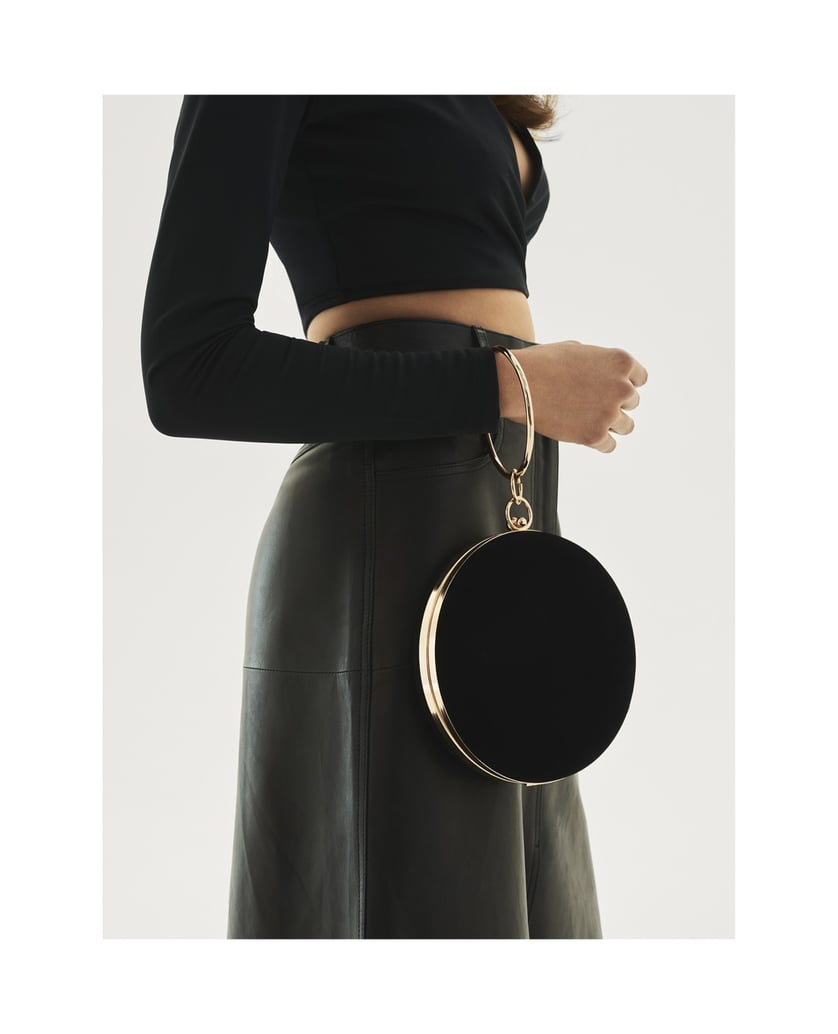 Kazar-Round-black-handbag-with-hoop-to-hand-čierna