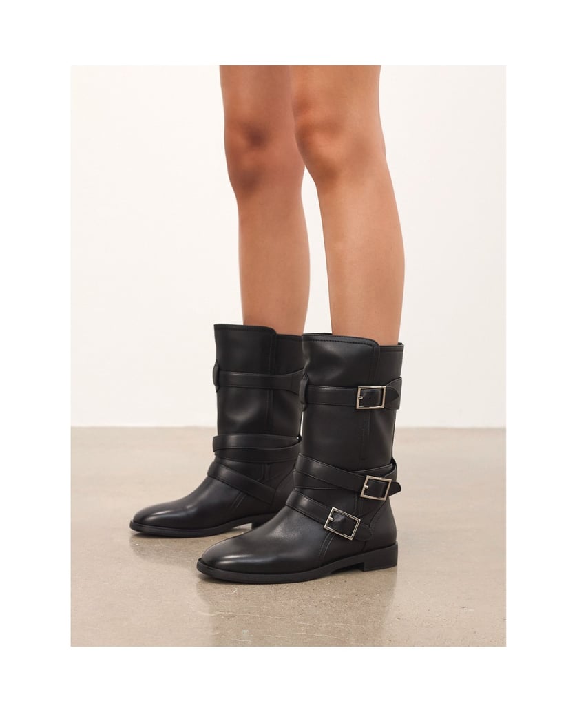 Kazar-Black-boots-with-a-higher-upper-decorated-with-buckles-čierna