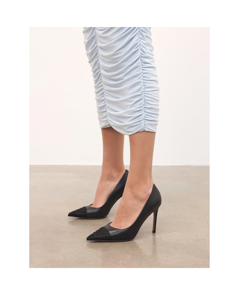 Kazar-Black-pumps-with-hair-finish-embellished-noses-černá