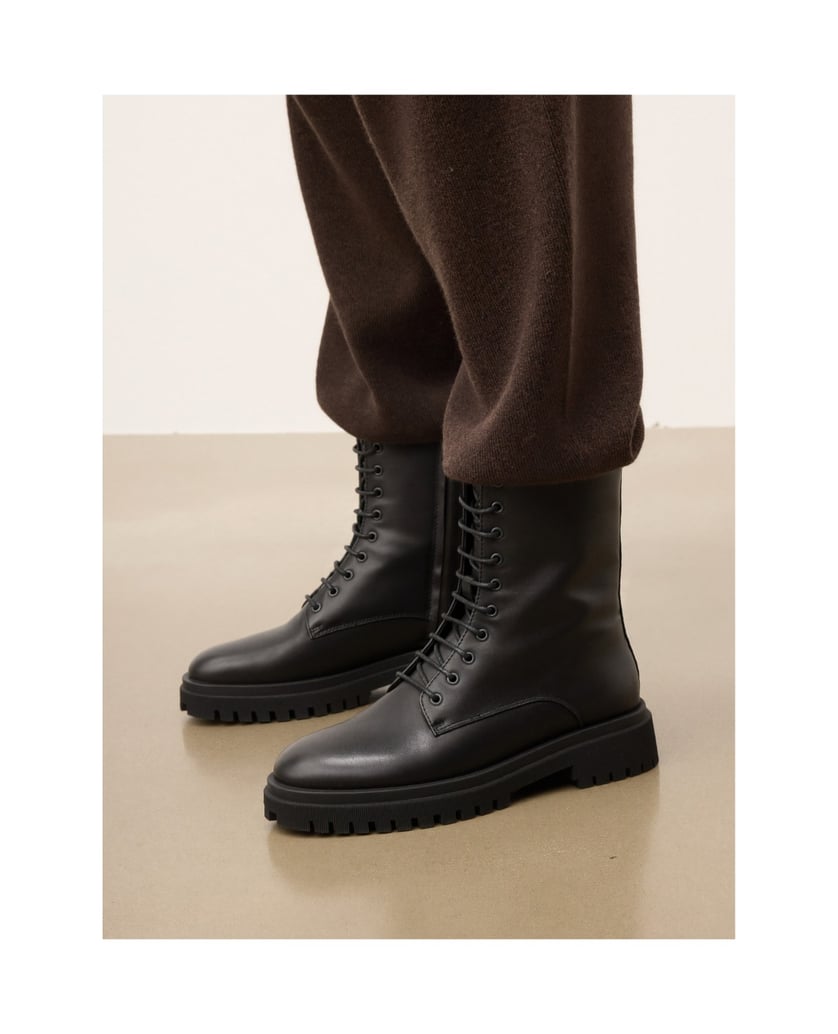 Kazar-Classic-black-boots-on-a-trefoil-sole-černá