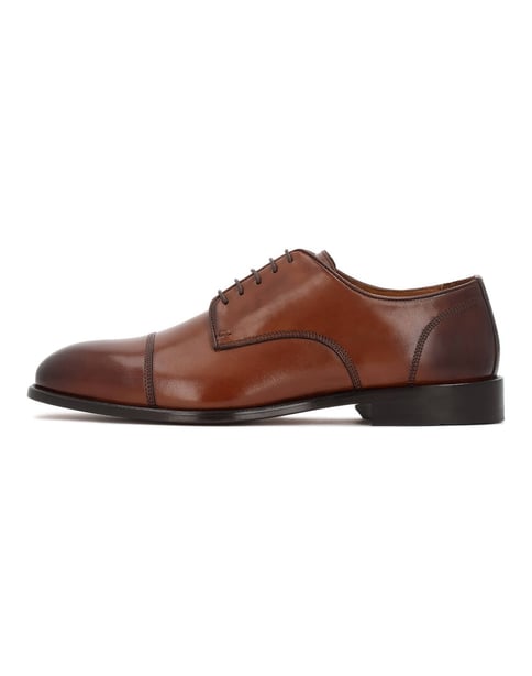 Brown shoes with overlapping toes