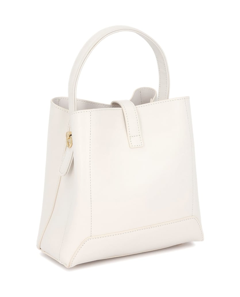 Kazar-Handbag-with-decorative-clasp-and-chain-biela