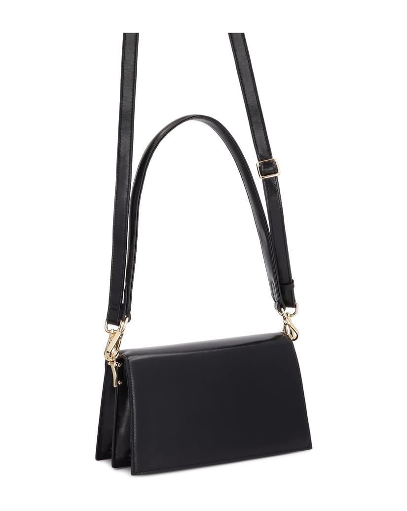 Kazar-Elegant-small-handbag-with-a-flap-closed-with-a-decorative-monogram-čierna