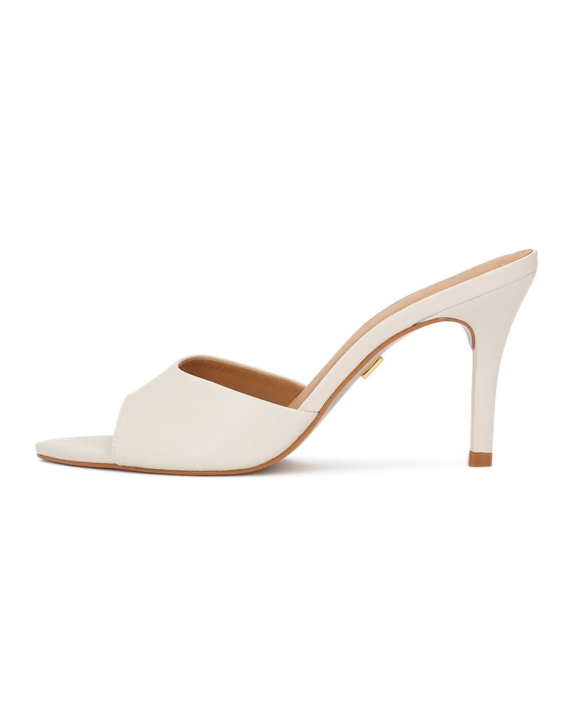 Kazar-Elegant-stiletto-mules-in-off-white-color-biela