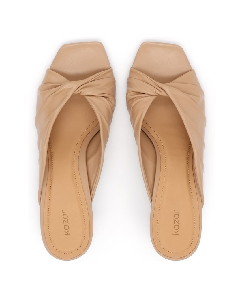 Kazar-Beige-leather-mules-with-an-eye-catching-crease-béžová