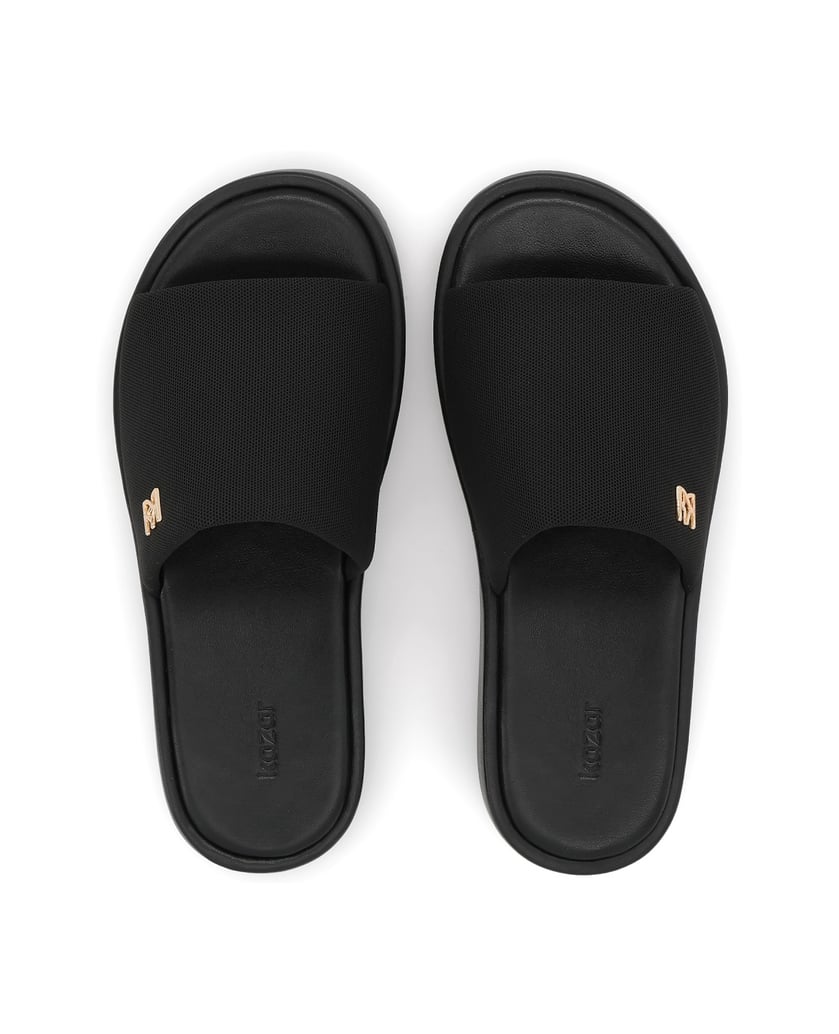 Kazar-Black-fabric-slides-on-a-thick-sole-with-a-gold-monogram-čierna