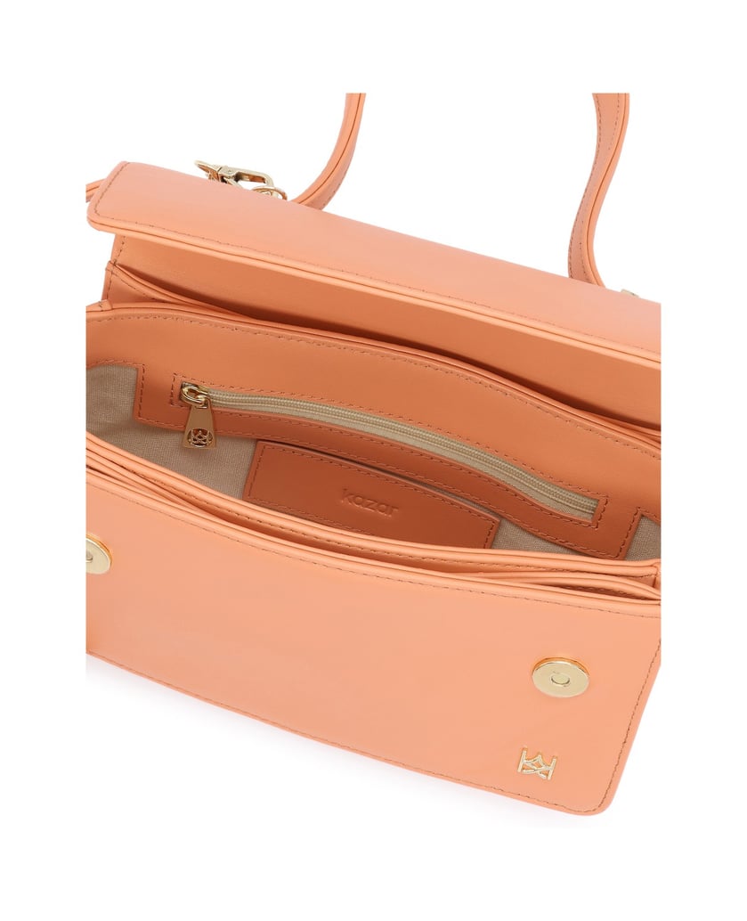 Kazar-Orange-oblong-bag-with-decorative-strap-and-keychains-oranžová