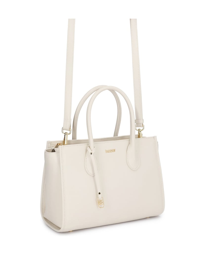 Kazar-Elegant-leather-bag-in-a-shade-of-broken-white-with-double-belts-bílá