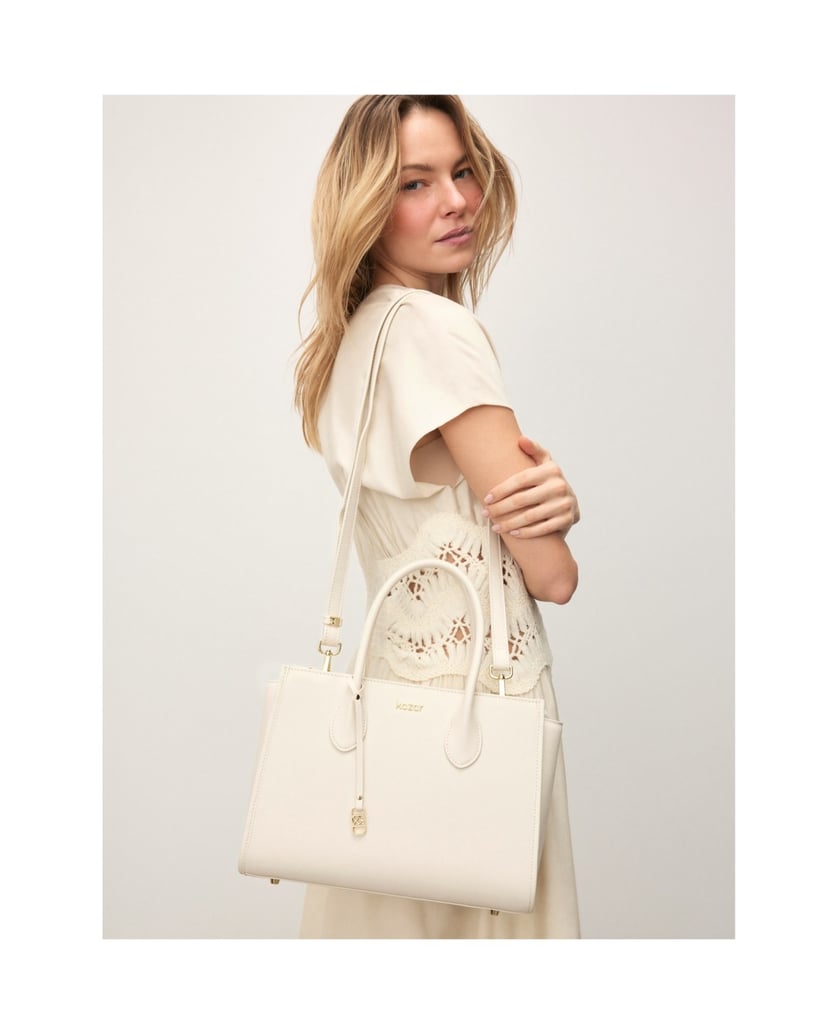 Kazar-Elegant-leather-bag-in-a-shade-of-broken-white-with-double-belts-bílá