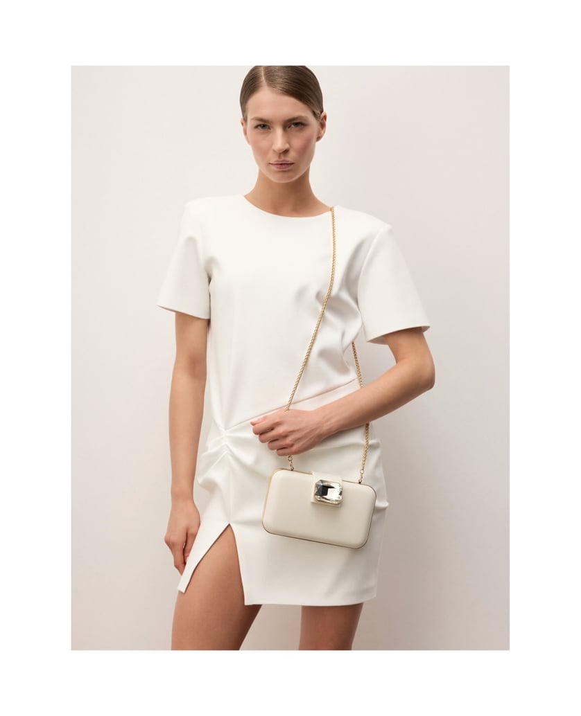 Kazar-Wedding-leather-clutches-in-a-shade-of-white-with-a-decorative-stone-bílá