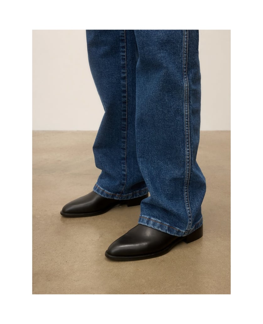Kazar-Black-leather-booties-with-strap-and-monogram-černá