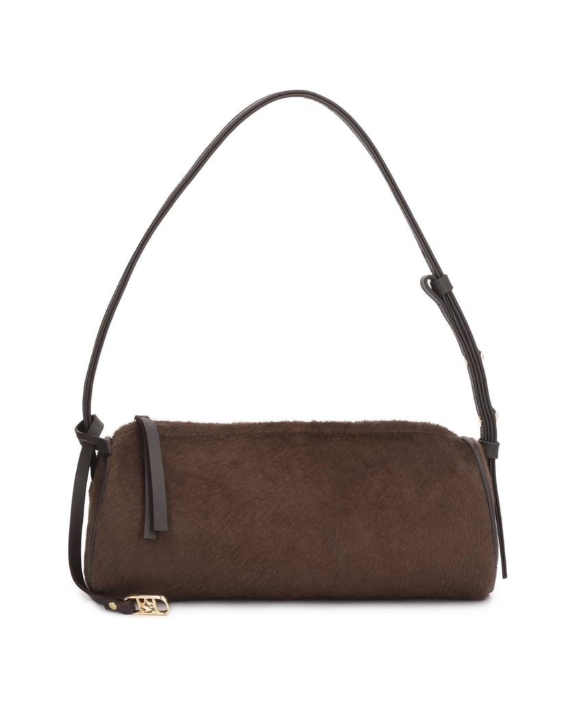 Kazar-Bag-in-hair-on-leather-with-leather-inserts-on-the-arm-hnedá