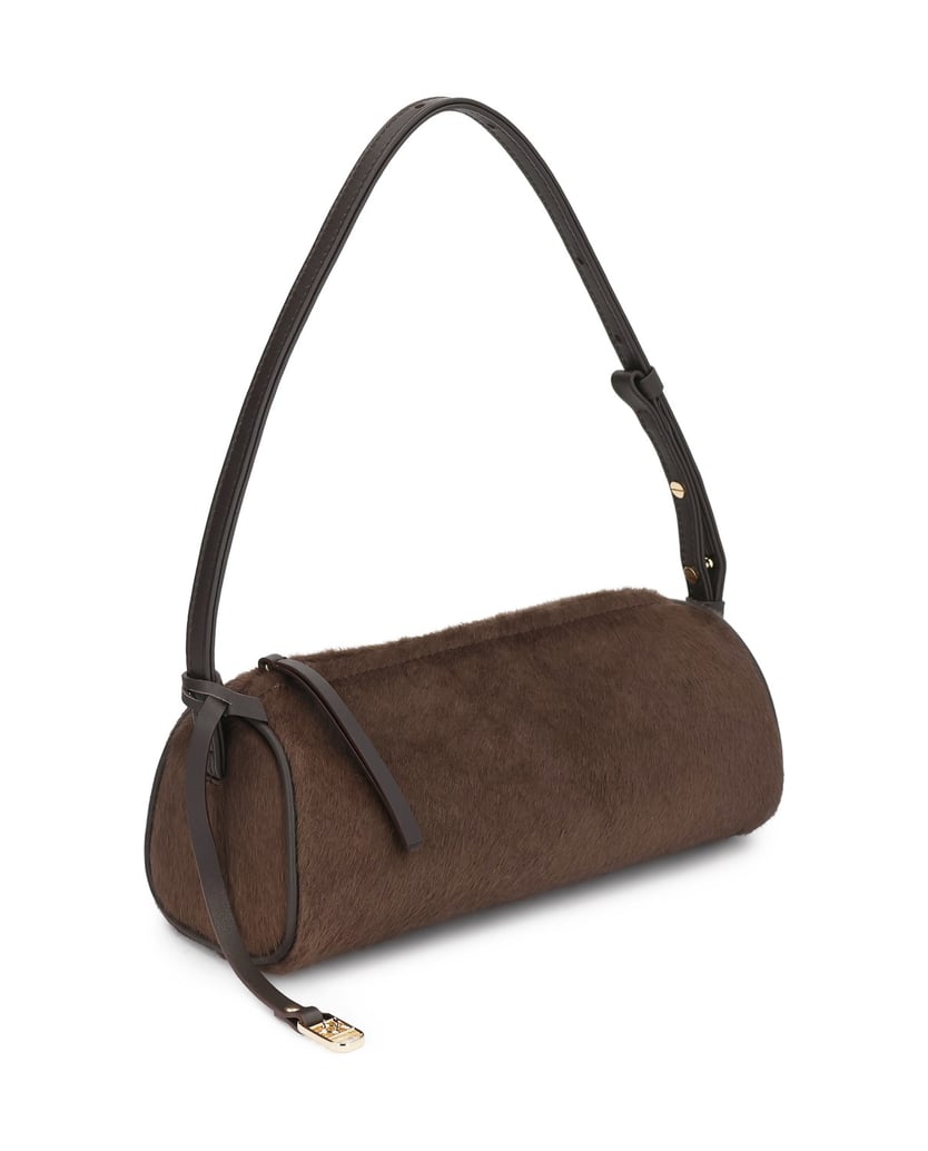 Kazar-Bag-in-hair-on-leather-with-leather-inserts-on-the-arm-hnedá