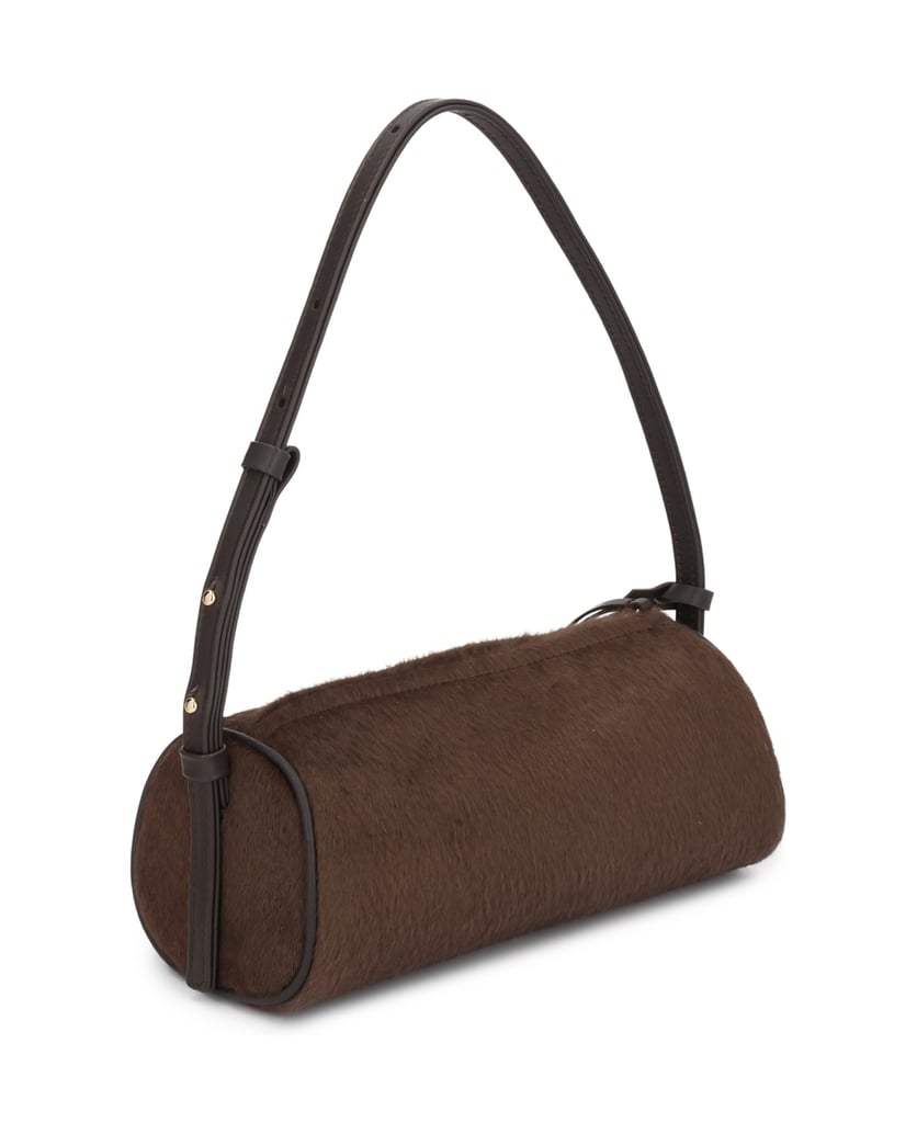 Kazar-Bag-in-hair-on-leather-with-leather-inserts-on-the-arm-hnedá