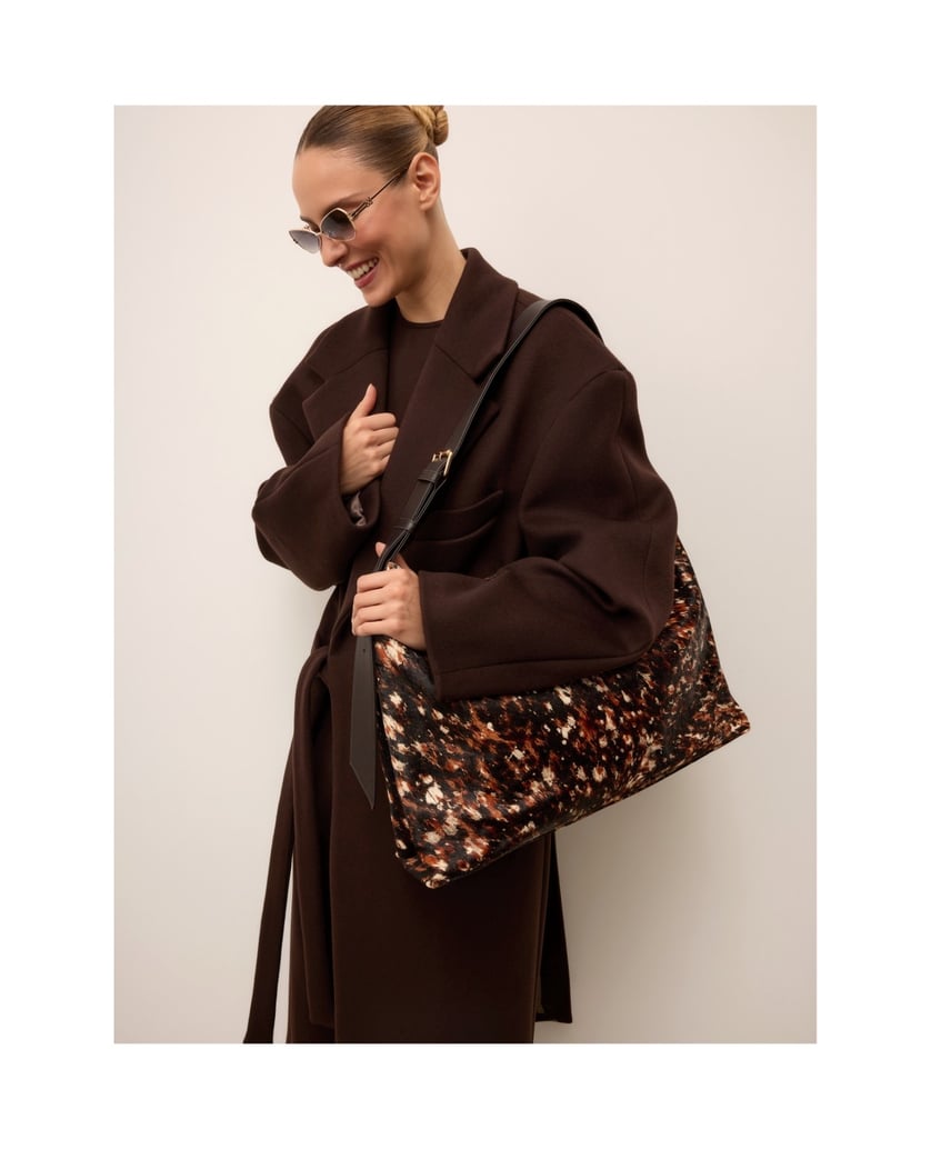 Kazar-EDITIONS-hobo-bag-in-hair-on-leather-with-a-mottled-pattern-barevná