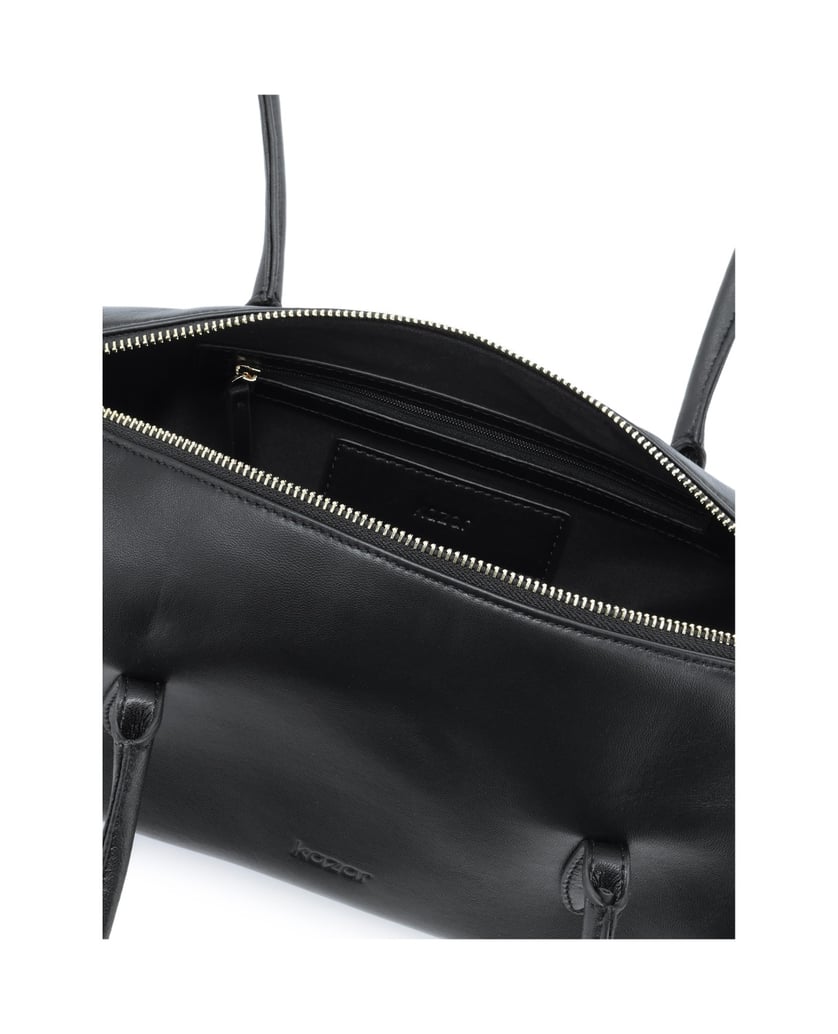 Kazar-Black-leather-baguette-bag-on-the-arm-černá