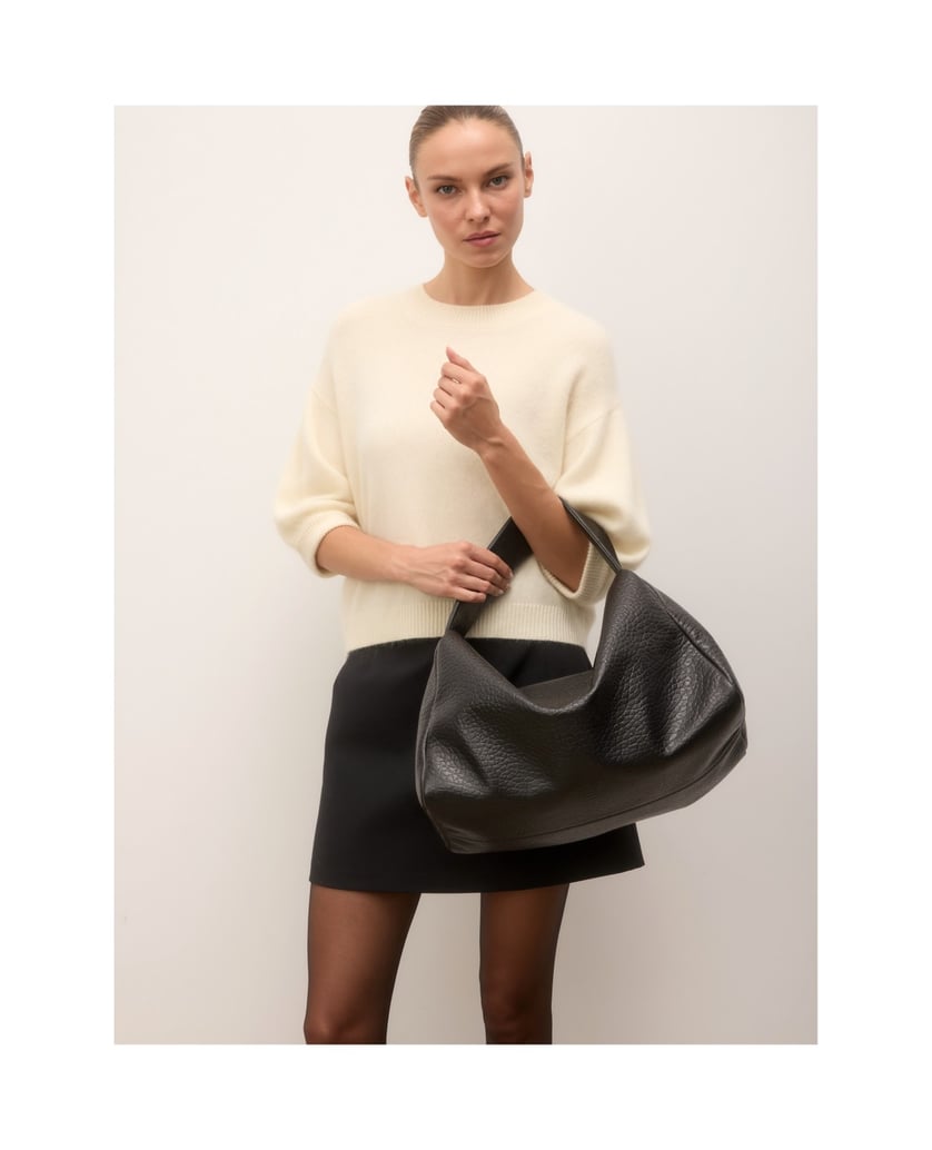 Kazar-A-spacious-black-leather-handbag-with-a-polka-dot-texture-čierna