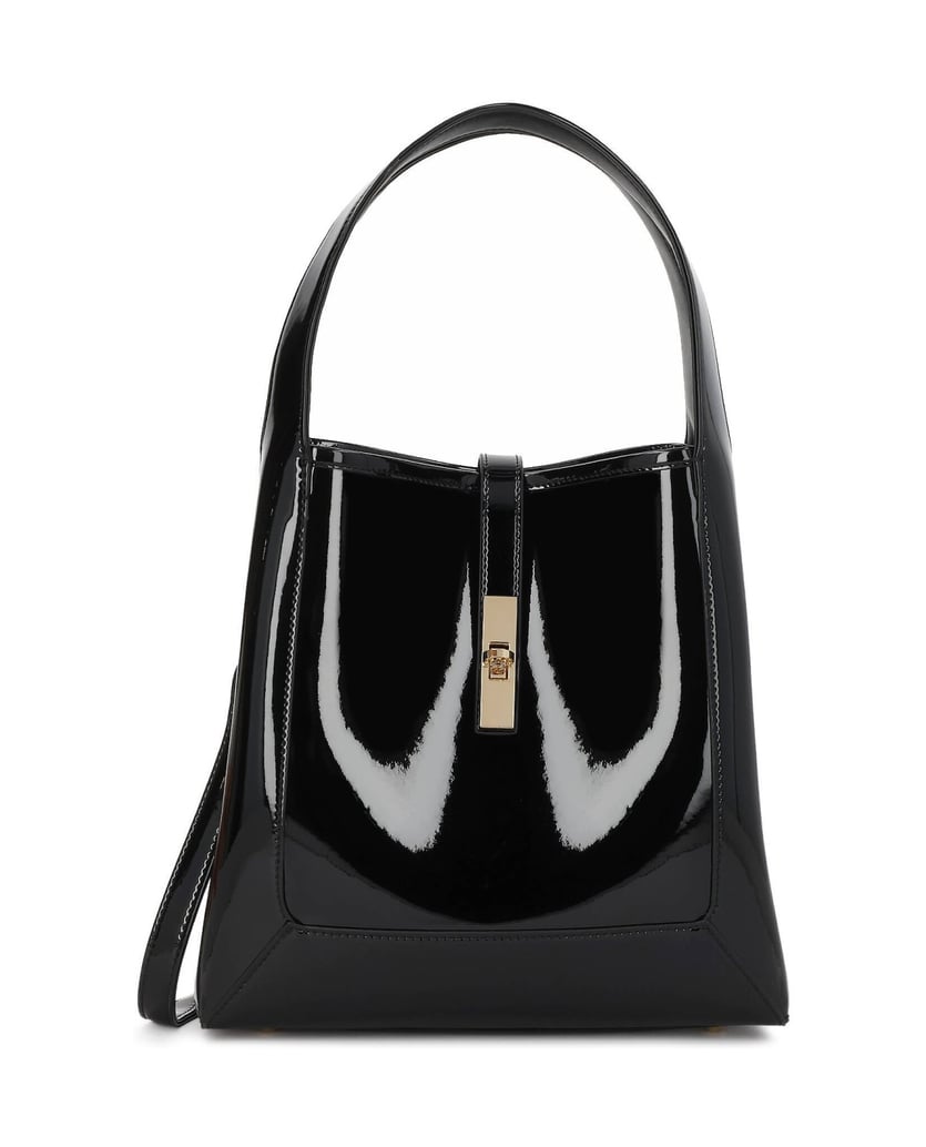 Kazar-Black-patent-handbag-with-monogrammed-clasp-čierna