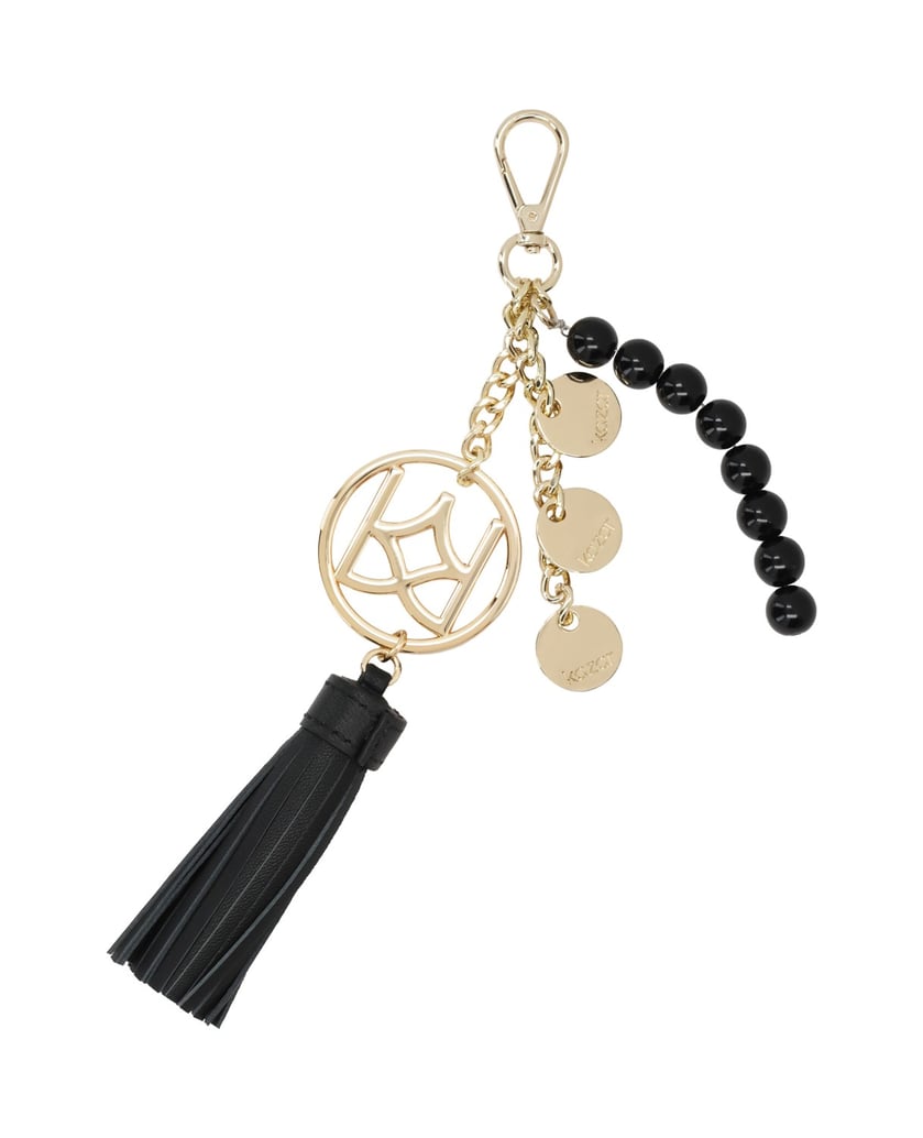 Kazar-Keychains-with-a-gold-monogram-and-a-gold-monogram.-černá
