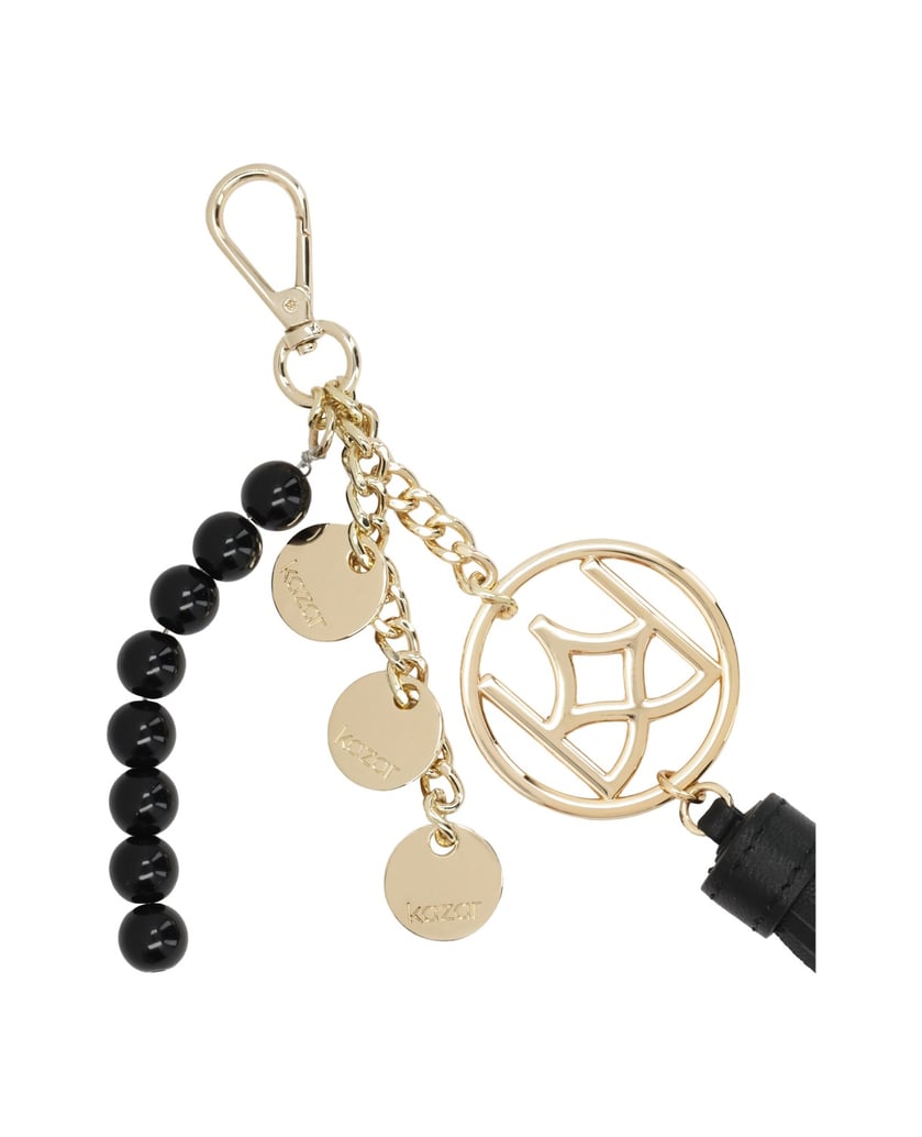 Kazar-Keychains-with-a-gold-monogram-and-a-gold-monogram.-černá