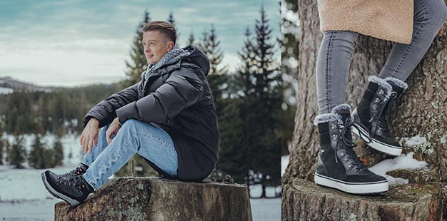 Junger Mann mit Winterstiefeln und Frau mit gefütterten Boots in Schneelandschaft.