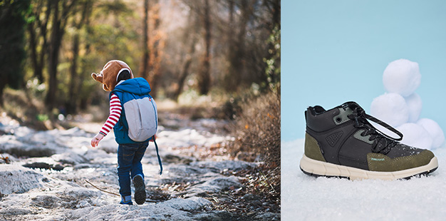 Mädchen in Winterlandschaft mit festem Schuhwerk.